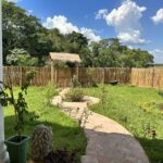 Der Gartenzugang mit verschlungenem Weg Der Gartenzugang mit verschlungenem Weg